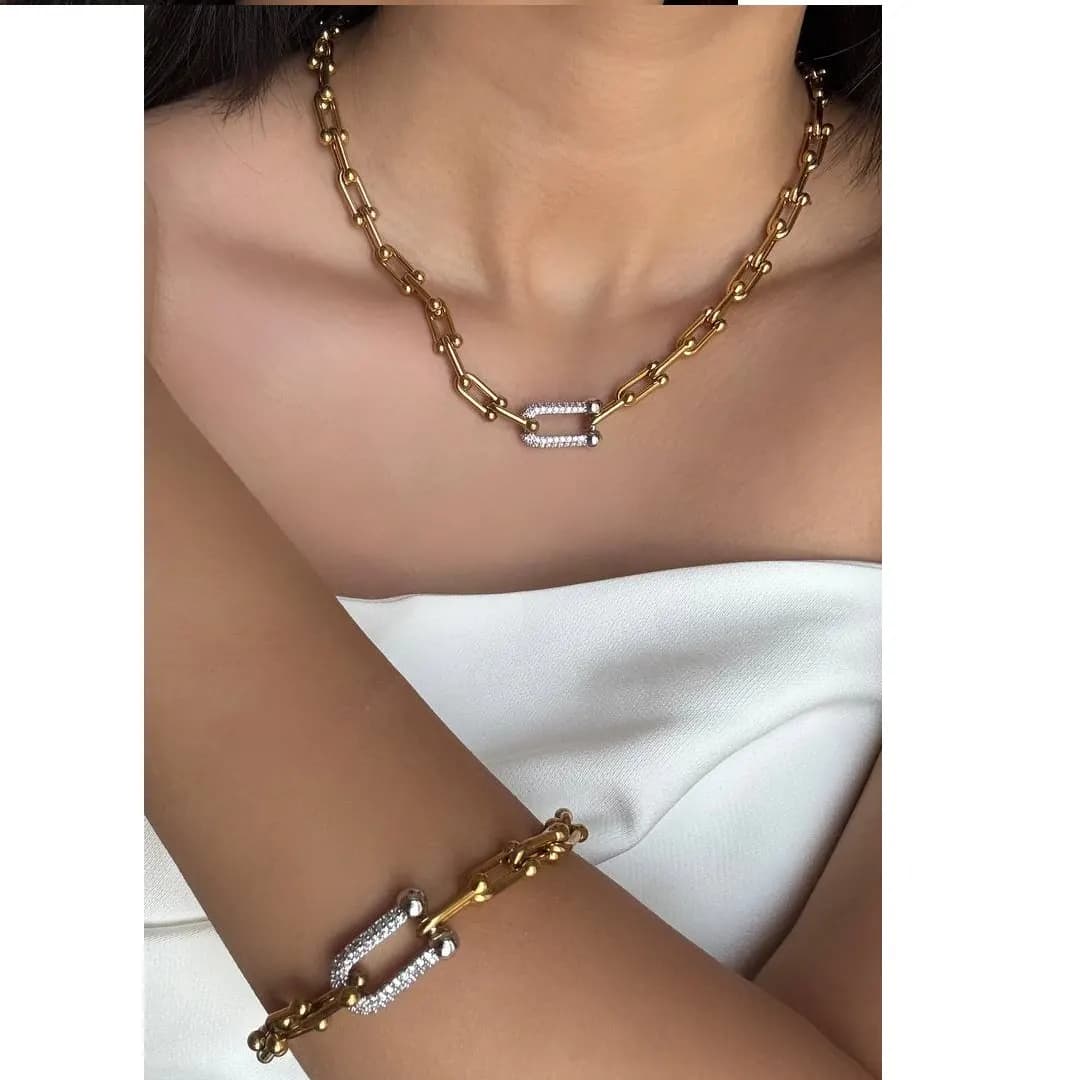 نیم ست گردنبند و دستبند زنانه طرح تیفانی Tiffany نگین کاری شده در دو رنگ طلایی و نقره ای مناسب روزمره و مهمانی آبکاری درجه یک نقره و رادیوم ضد حساسیت و رنگ ثابت کد zgc