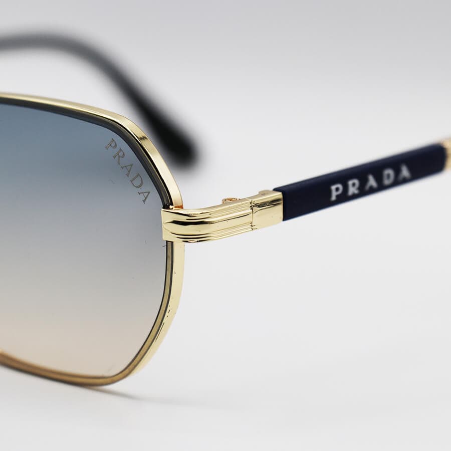 عینک آفتابی PRADA با فریم رنگ طلایی، شکل هندسی و لنز دو رنگ و هایلایت مدل 0548 — تصویر ۶