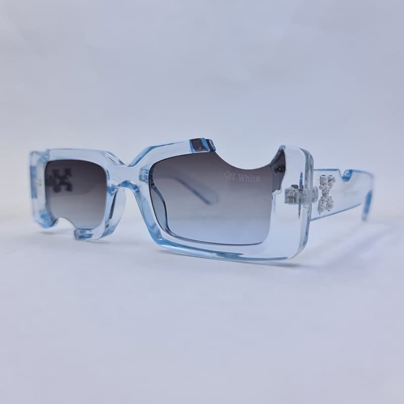 عینک آفتابی اف وایت با فریم آبی رنگ و شفاف و فانتزی طرح گاز زده مدل 22030 — تصویر ۴