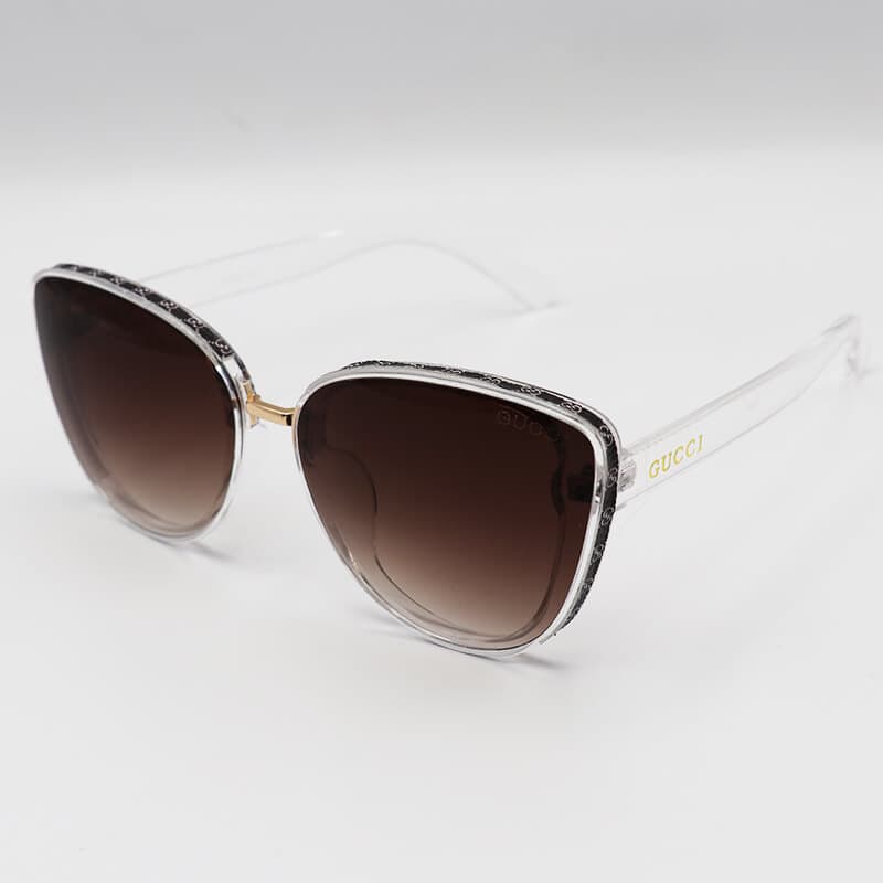 عینک آفتابی زنانه GUCCI با فریم شفاف و بی رنگ، گربه ای و لنز قهوه ای مدل 7257 — تصویر ۲