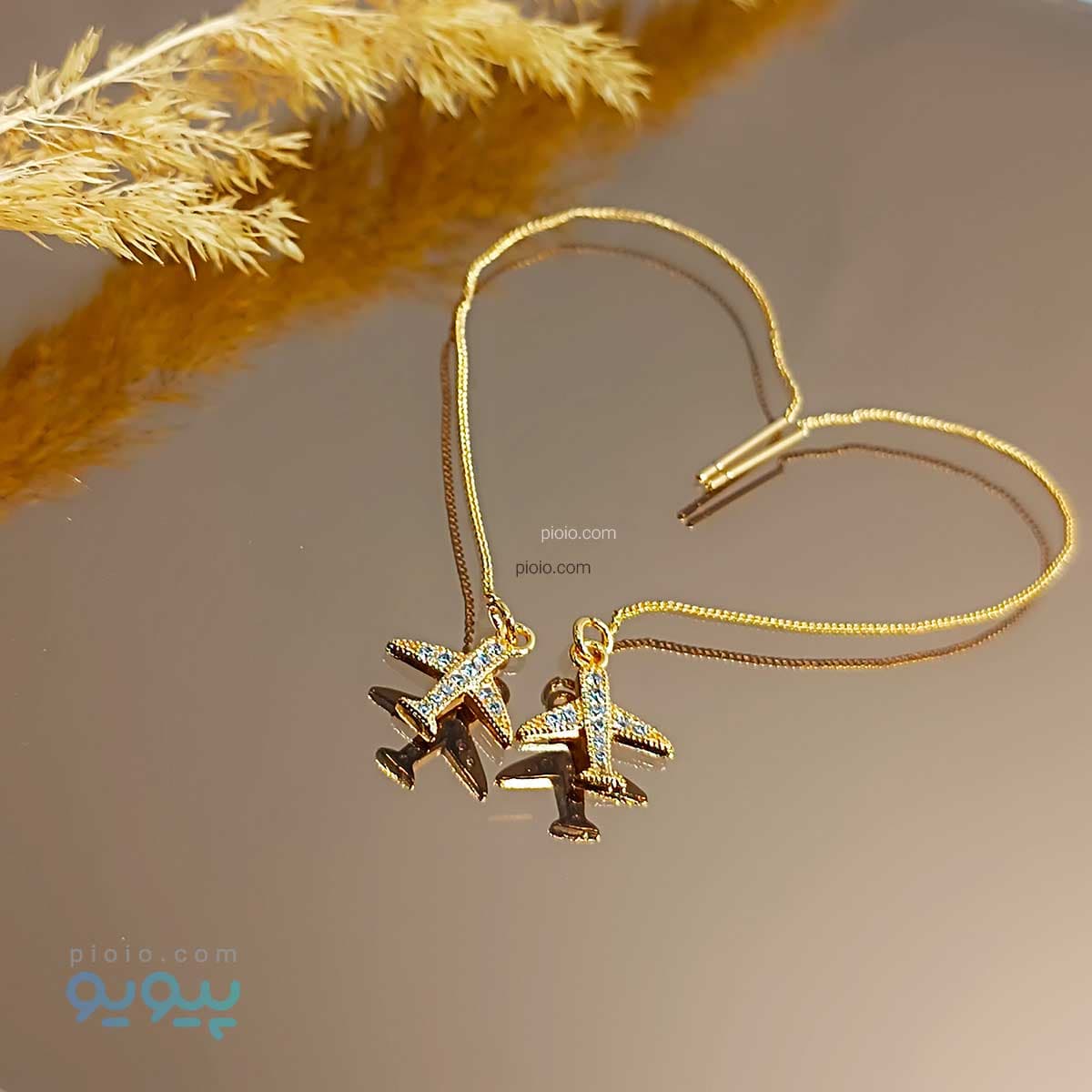 گوشواره بخیه ای طرح هواپیما