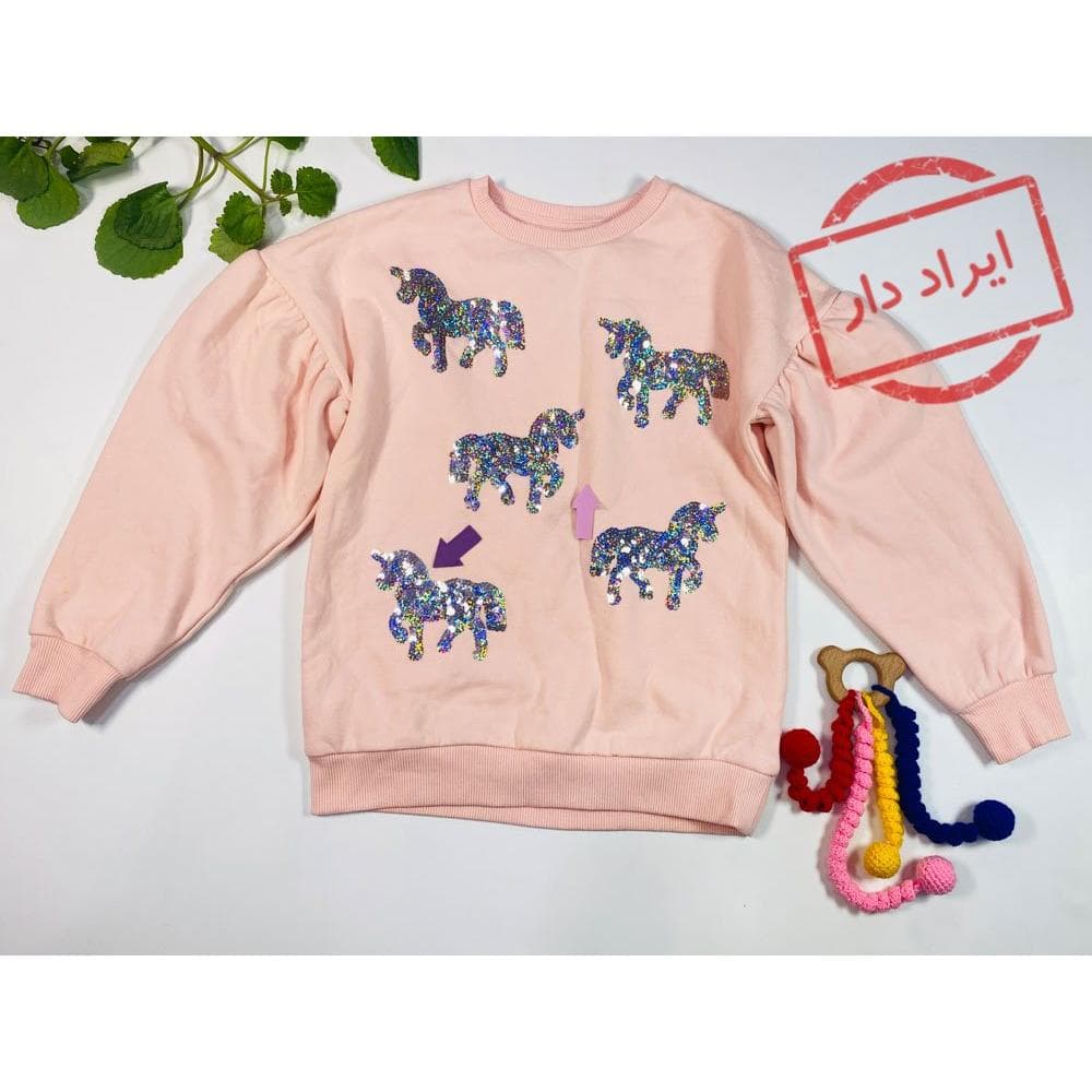 ایراد دار _ بلوز دخترانه آستین بلند طرح اسب تک شاخ پولکی دورس یقه گرد صورتی کمرنگ – 9 تا 10 سال