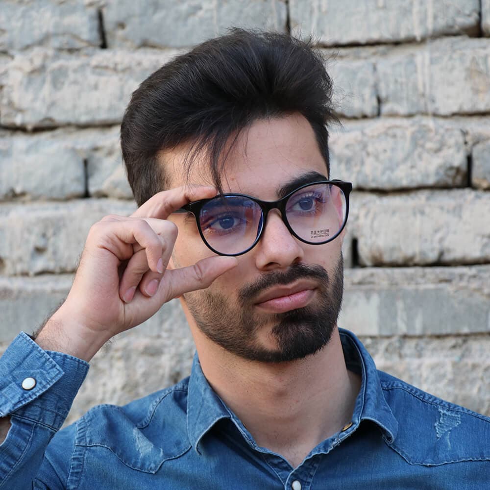 عینک بلوکات با فریم مشکی رنگ، از جنس کائوچو، شکل گرد و لنز UV400 مدل 28020 — تصویر ۶