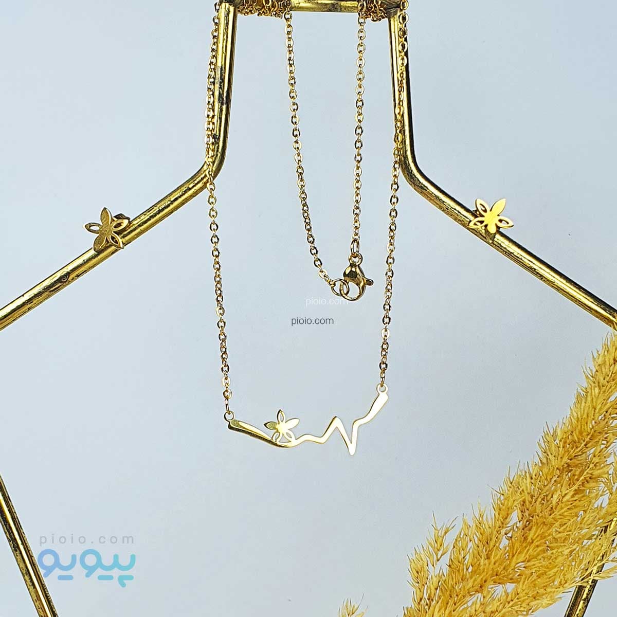 نیم ست گردنبند و گوشواره طرح ضربان و گل — تصویر ۲