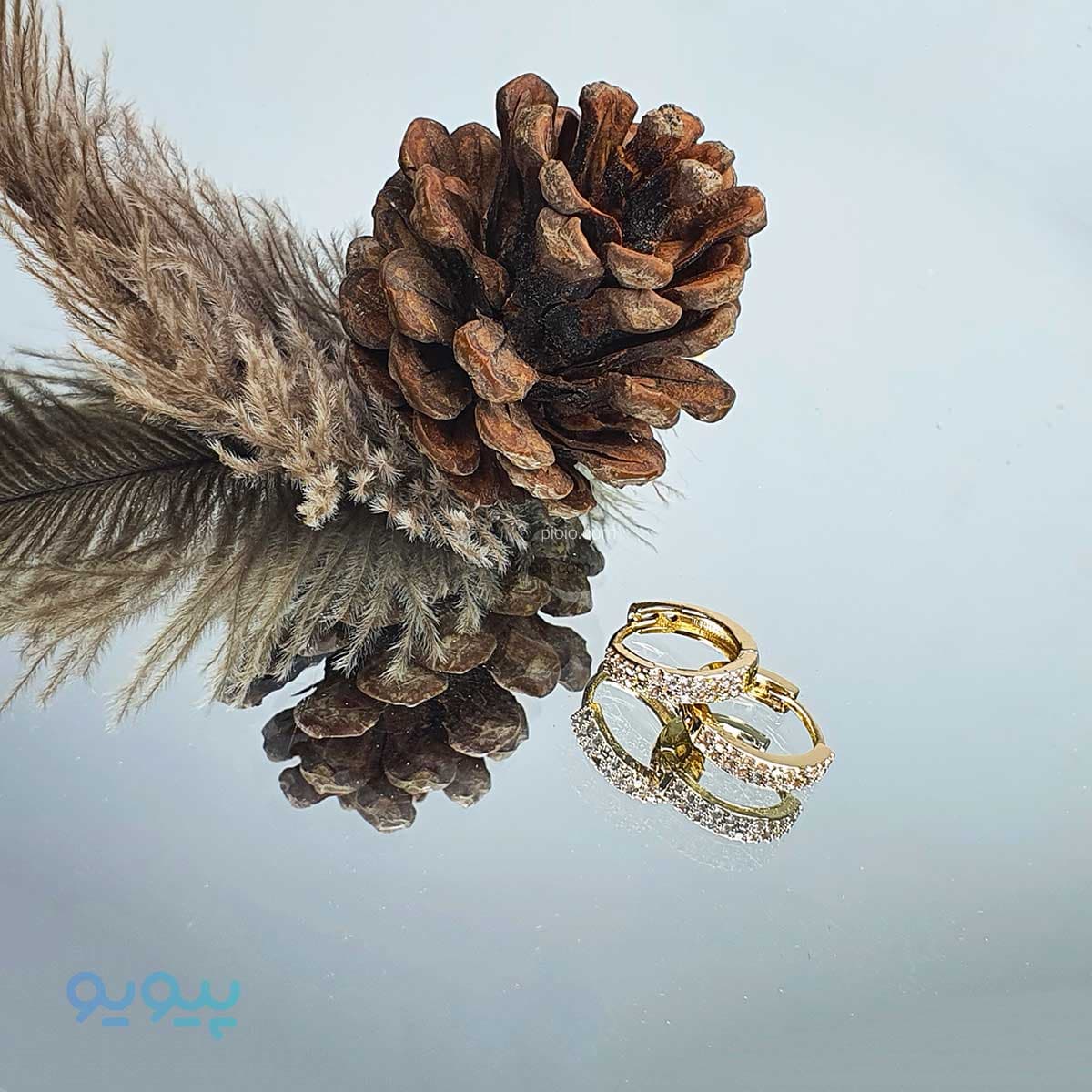 گوشواره طرح دایره ای نگین دار