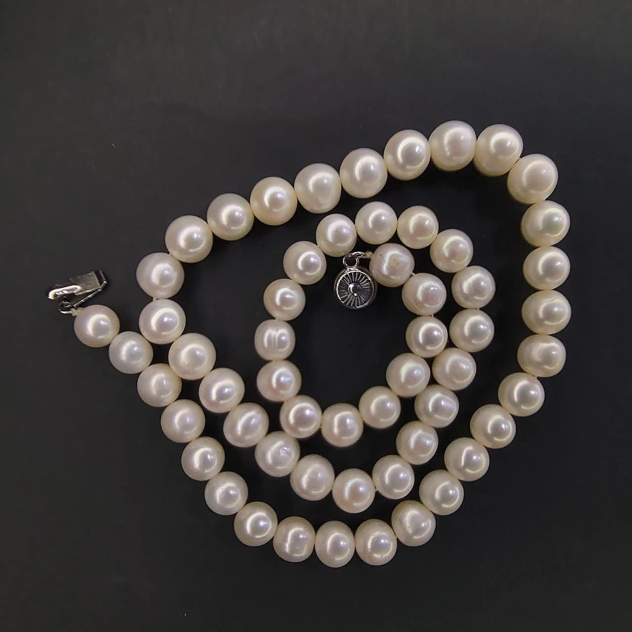گردنبند مروارید طبیعی 57 دونه براق گرید A+ — تصویر ۳