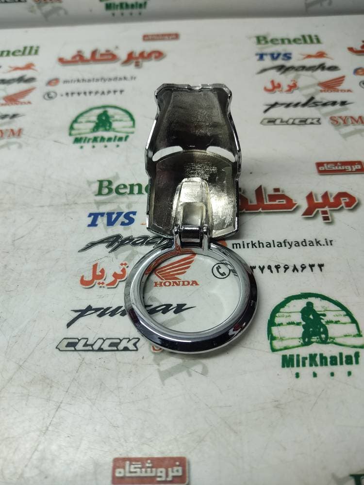 قاب کاور (محافظ) تزئینی روی سوییچ انواع موتورسیکلت نقره ای استیل (فلزی) — تصویر ۲