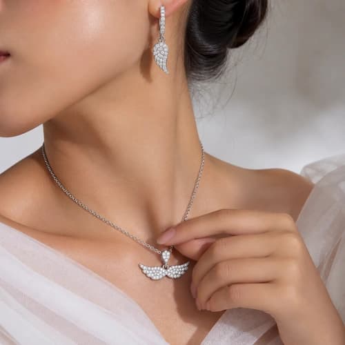 نیم ست نقره زنانه | مدل بال پرنده کد SWN475 — تصویر ۵