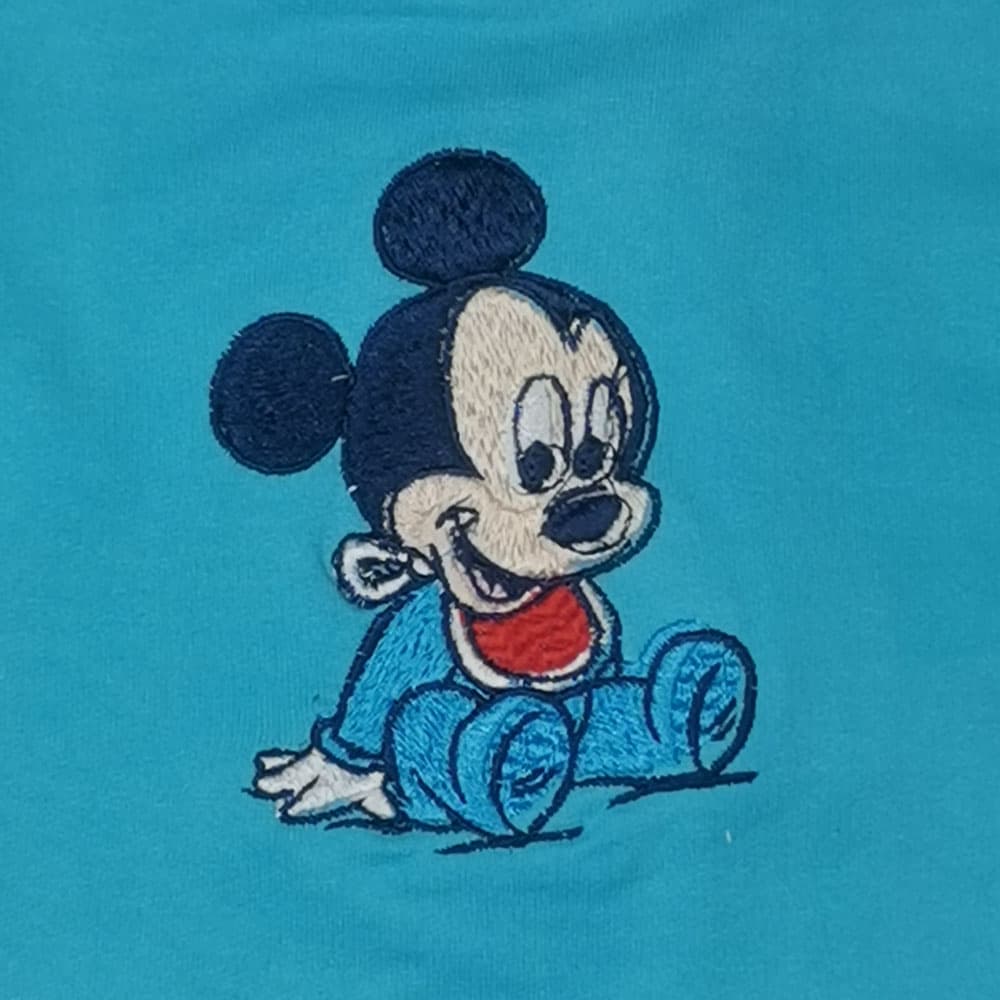 سرهمی نوزادی پسرانه آستین بلند برند Disney طرح میکی موس تو دورس آبی رنگ – 12 تا 18 ماه — تصویر ۲