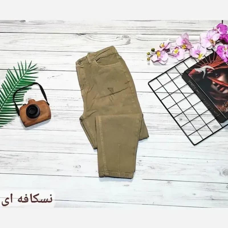 شلوار جین مام فیت زنانه پشت کمر کش رنگی سایز 36 تا 46 — تصویر ۷