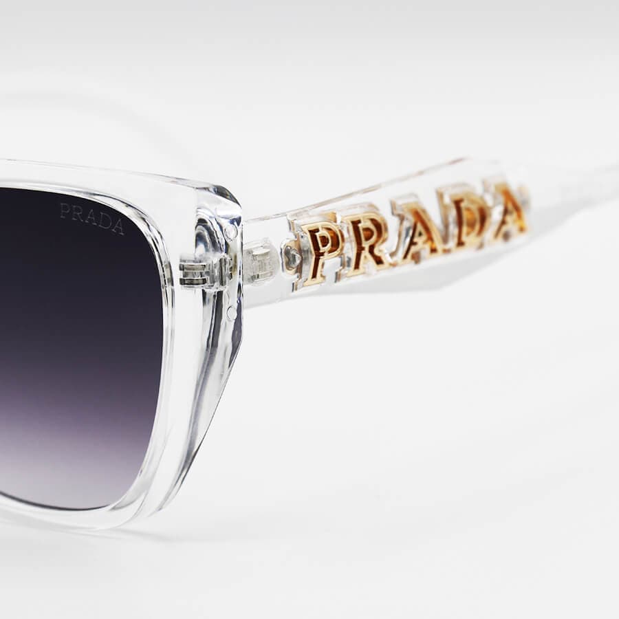 عینک آفتابی زنانه PRADA با فریم پروانه ای، بی رنگ، شفاف و لنز دودی هایلایت مدل 2837 — تصویر ۵