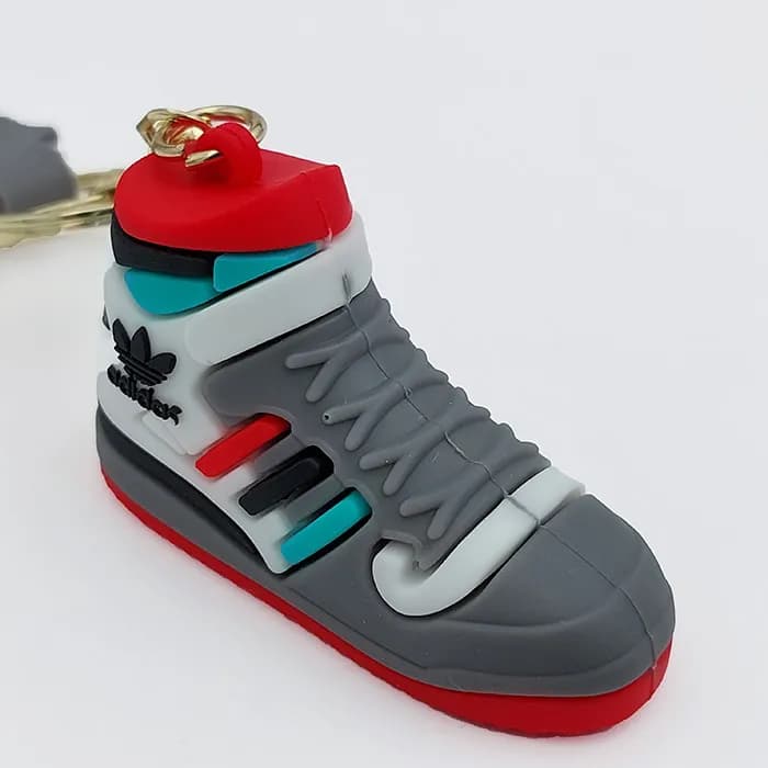 سرکلیدی سیلیکونی کفش آدیداس adidas طوسی 39060 — تصویر ۲