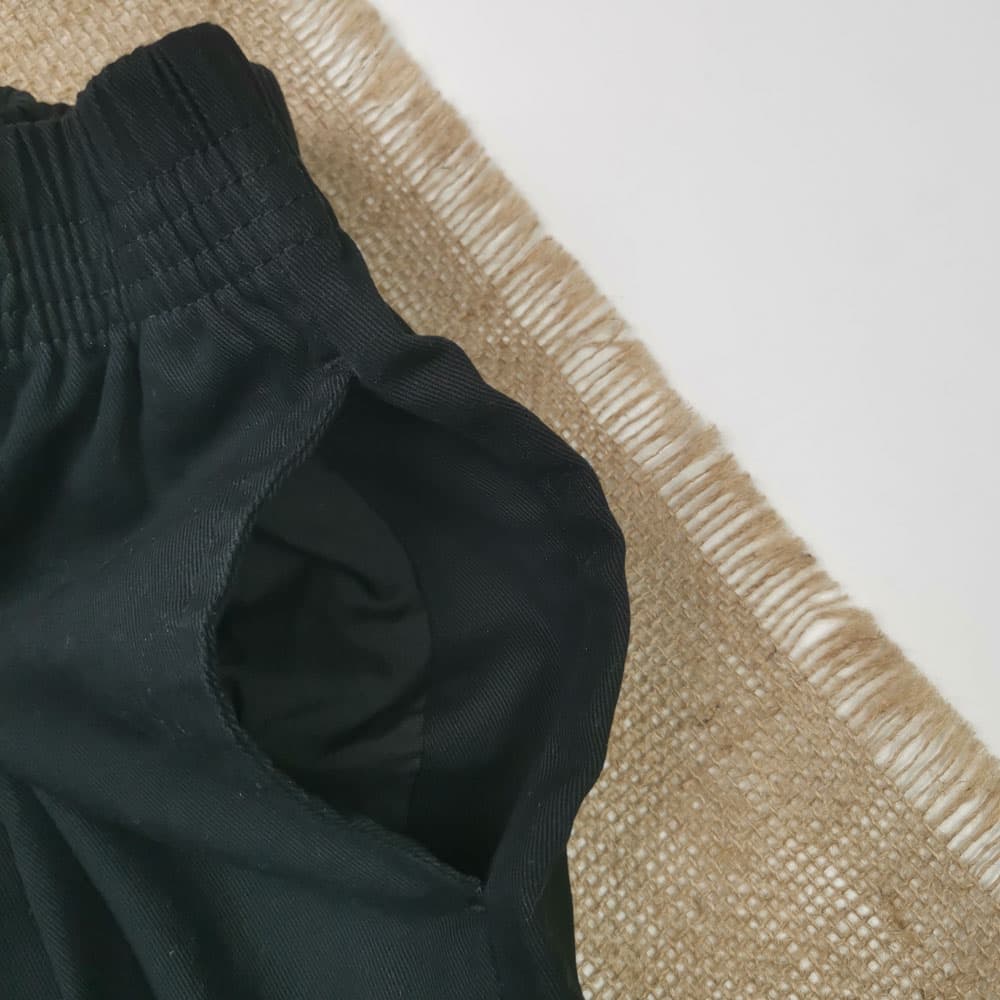 شلوارک برند Tu طرح جیب دار مشکی رنگ – 7 سال — تصویر ۴