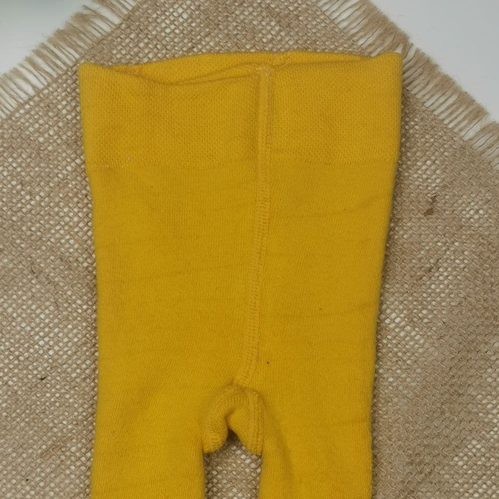 جوراب شلواری نوزادی برند لوپیلو طرح دون دونی تو حوله ای خردلی رنگ – 2 تا 6 ماه — تصویر ۳