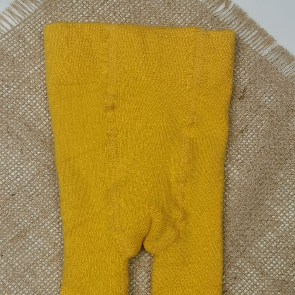 جوراب شلواری نوزادی برند لوپیلو طرح دون دونی تو حوله ای خردلی رنگ – 2 تا 6 ماه — تصویر ۴