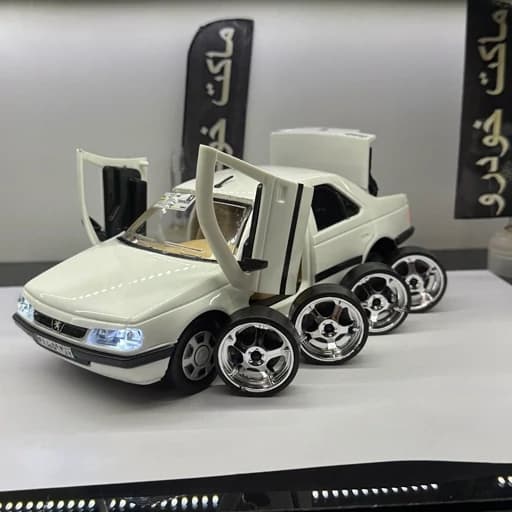 اسباب بازی ماکت پژو 405 SLX سفید چراغدار داخل کرم