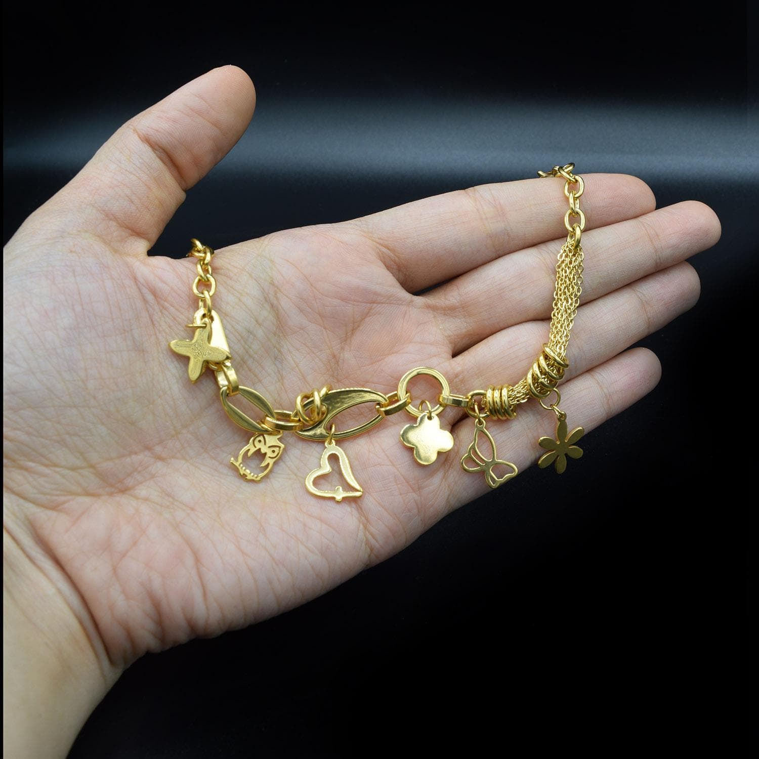 دستبند زنانه استیل آویزدار طرح طلا ds-n395 — تصویر ۴
