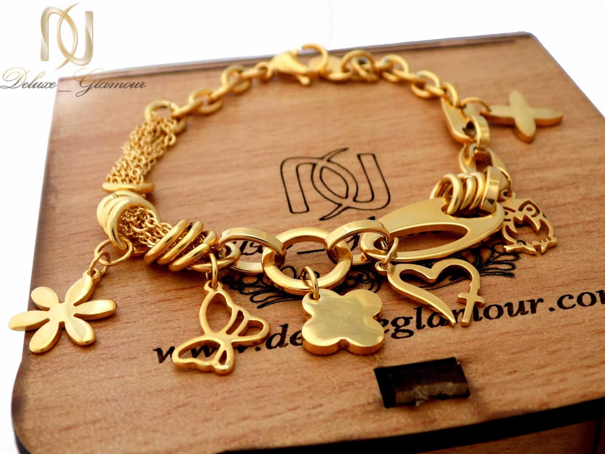 دستبند زنانه استیل آویزدار طرح طلا ds-n395 — تصویر ۲
