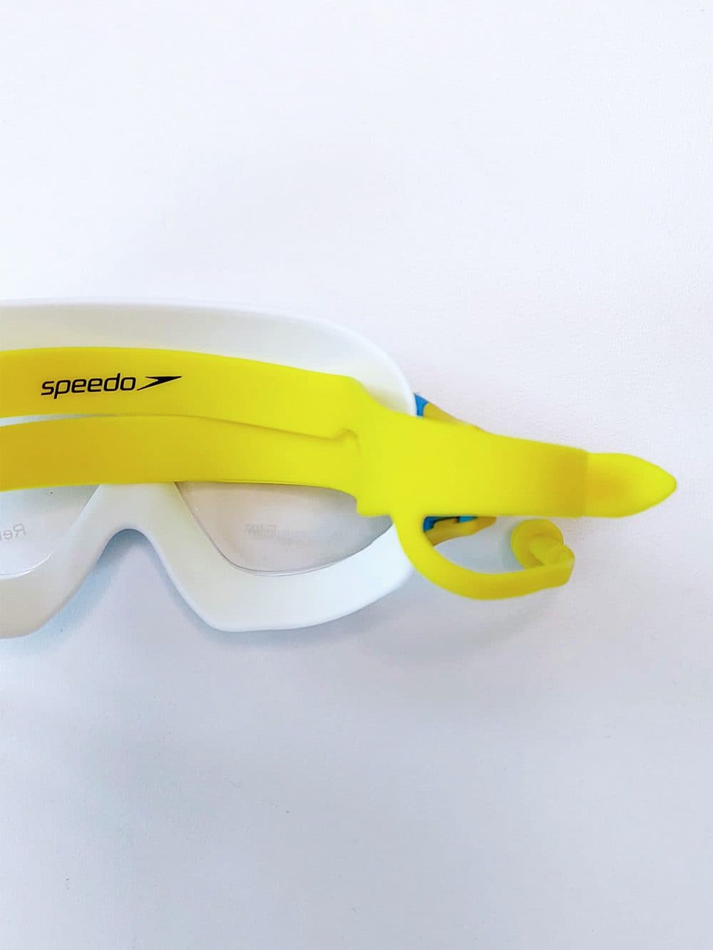 عینک استخر فریم بزرگ کودکان دخترانه و پسرانه گوشگیر دار اسپیدو ( Speedo ) زرد و آبی — تصویر ۵