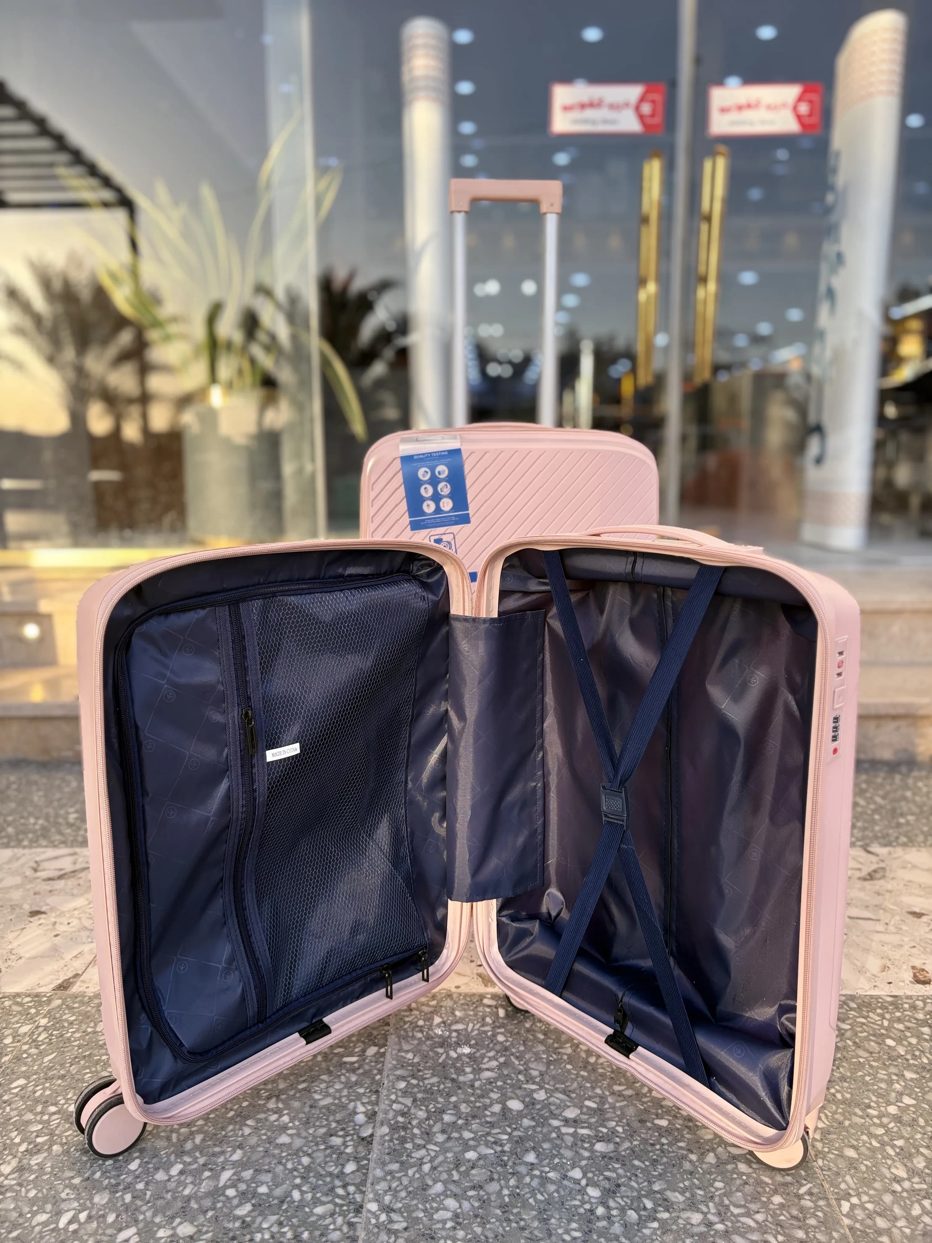 چمدان نشکن وارداتی تک سایز چهار چرخ طرح مورب (x) — تصویر ۳