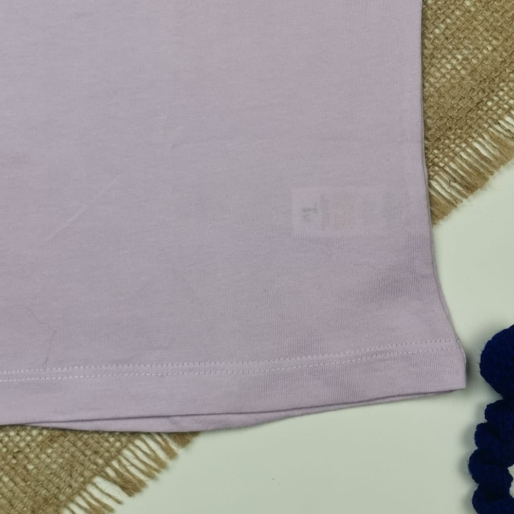 تاپ نوزادی دخترانه آستین تاپ برند Tu طرح السا و آنا پاپیون دار یاسی کمرنگ – 6-7 سال — تصویر ۵