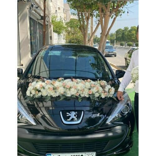 ماشین عروس 207 اجرا با گل های طبیعی سفید 5120