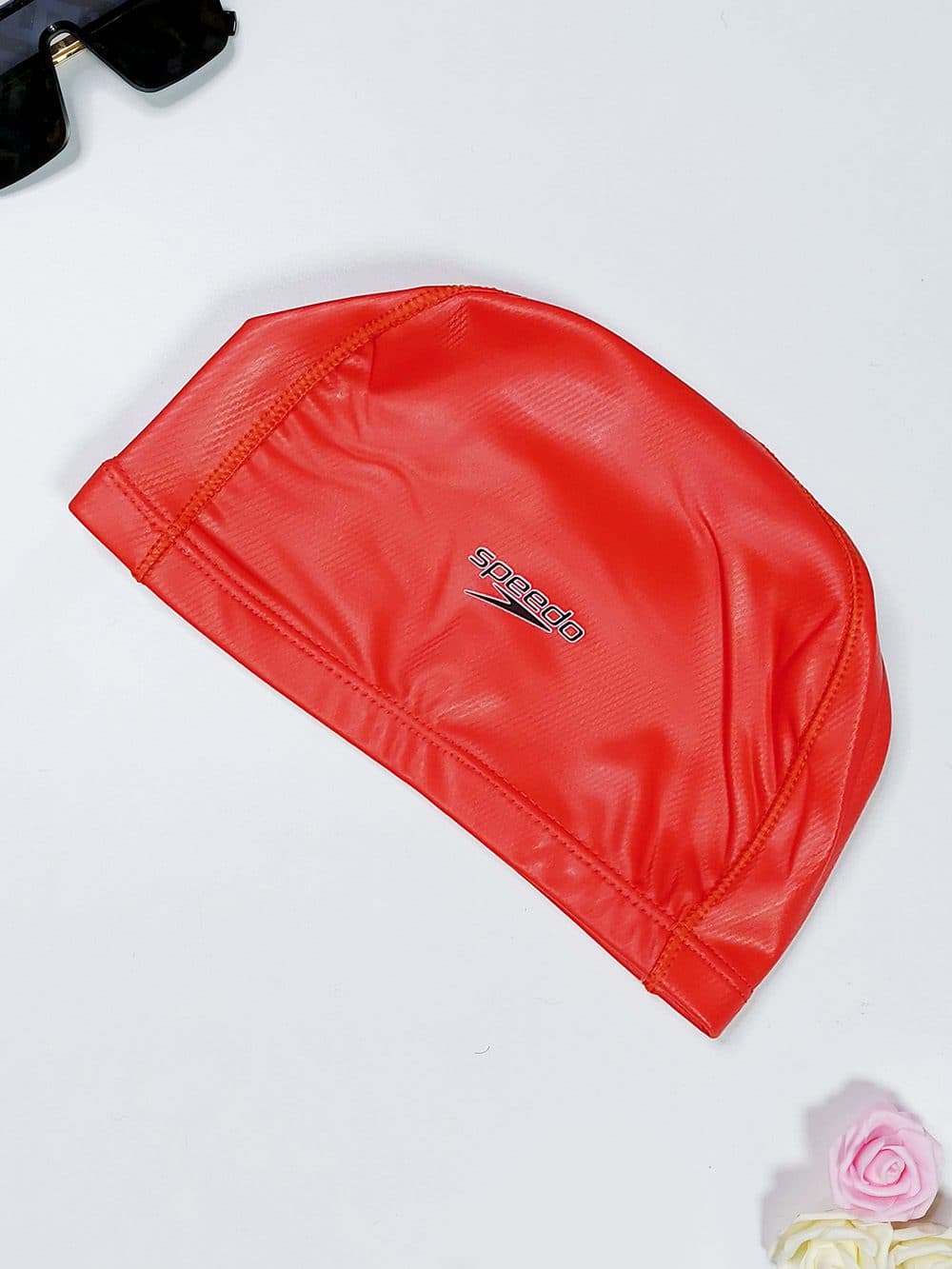 کلاه استخر شنا زنانه قرمز رنگ اسپیدو ( Speedo ) ضد کلر با جنس فومی
