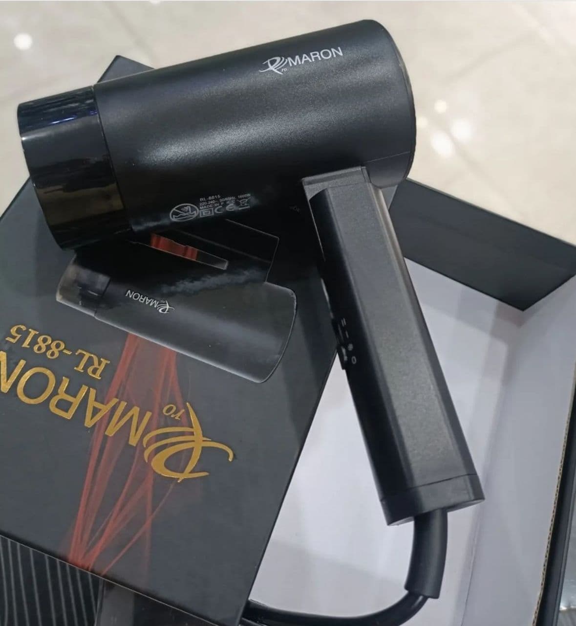 سشوار مسافرتی تاشو پرومارون مدل RL-8815 توان 1600 وات