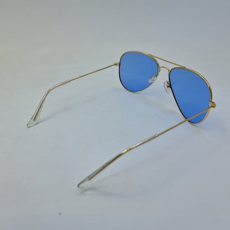 عینک دید در شب با لنز آبی رنگ و فریم طلایی خلبانی Ray-Ban مدل 3026 — تصویر ۸