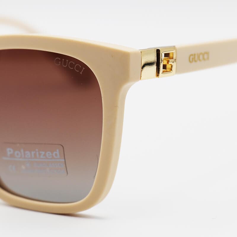 عینک آفتابی GUCCI با فریم مربعی شکل، کرمی رنگ و عدسی قهوه ای و پلرایزد مدل D2345P — تصویر ۵