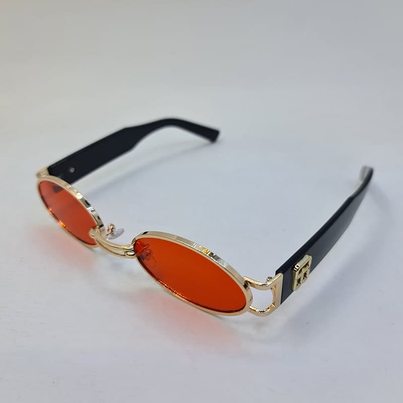 عینک شب جنتل مانستر با فریم طلایی، بیضی شکل و دسته مشکی و لنز قرمز مدل B2069 — تصویر ۵