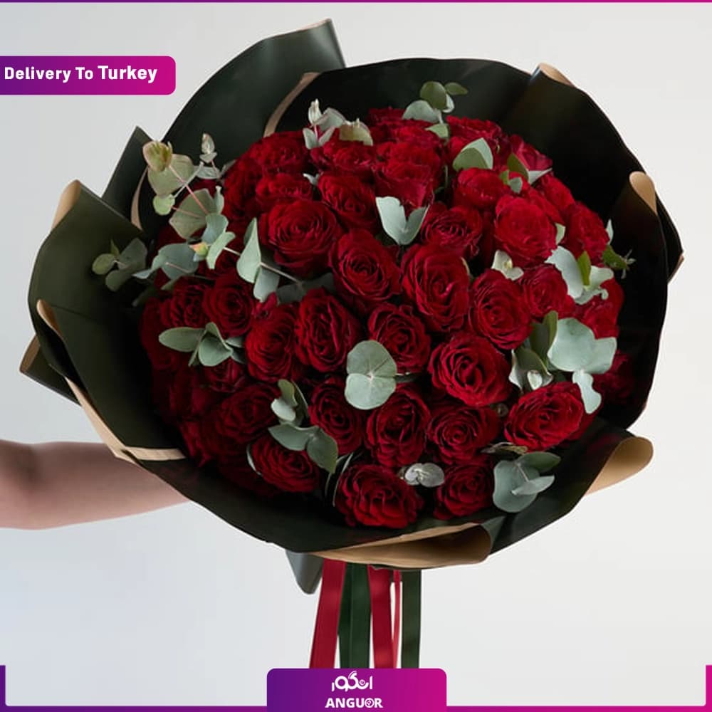 دسته گل 60 شاخه رز قرمز و عروس (ارسال گل به ترکیه)