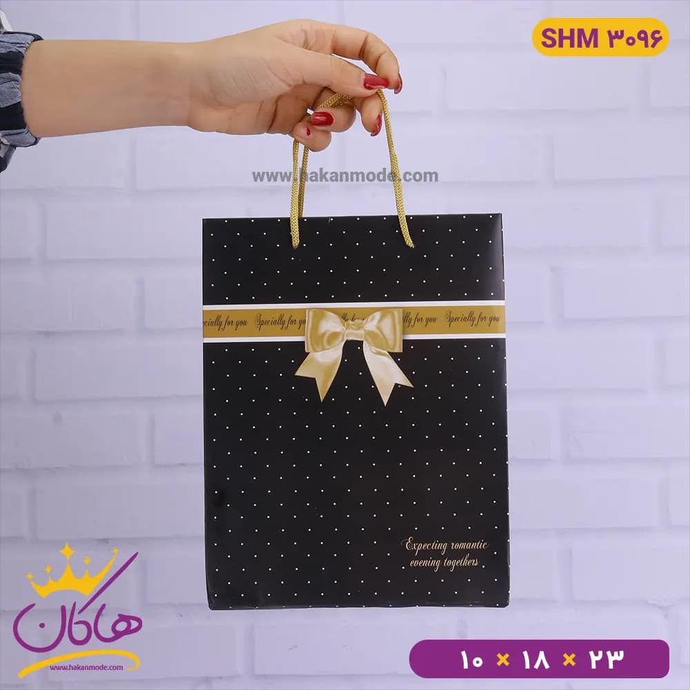 ساک دستی مشکی پاپیون طلایی | کد Shm3096 — تصویر ۳