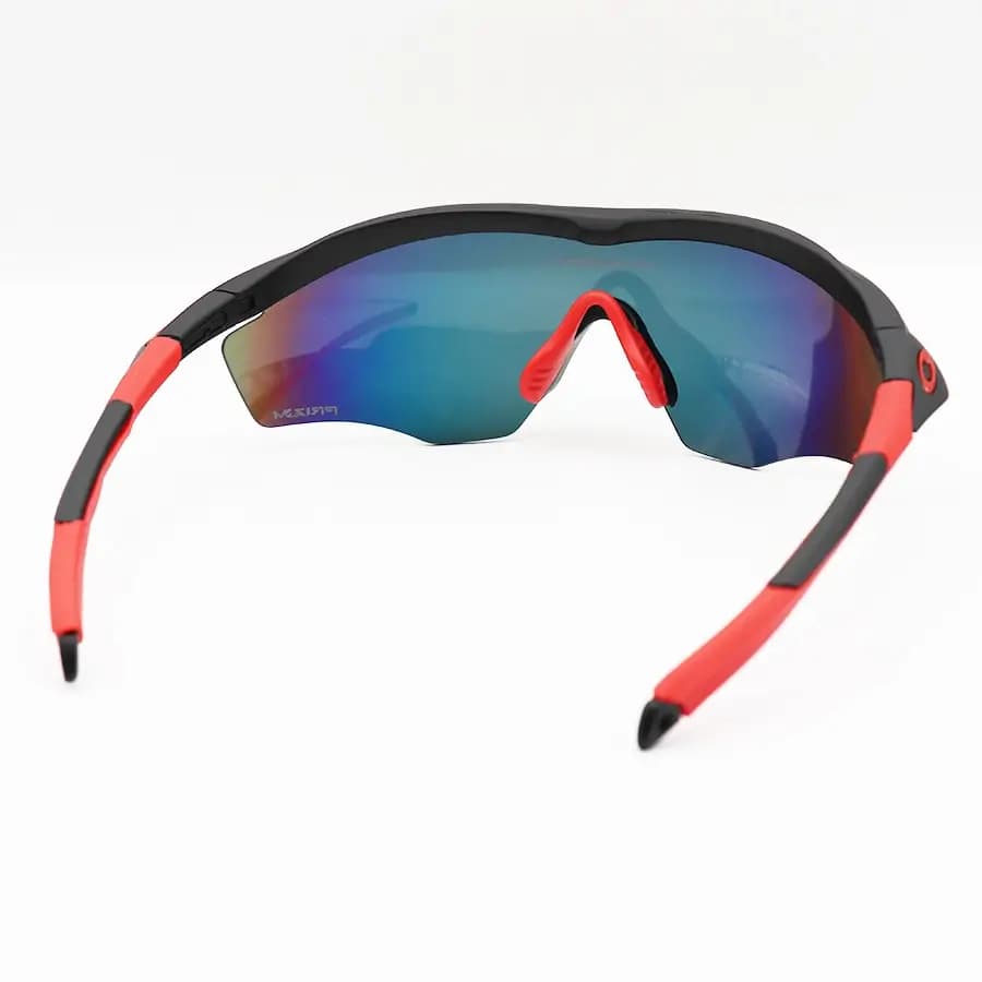 عینک ورزشی OAKLEY طرح M2 Frame با فریم مشکی مات، نیم فریم و لنز جیوهای و چند رنگ مدل OO9343 — تصویر ۴