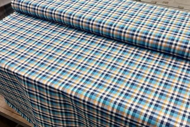 پارچه چهارخونه زمینه فیروزه ای – سرمه ای (طرح متوسط عرض 1.5) — تصویر ۲