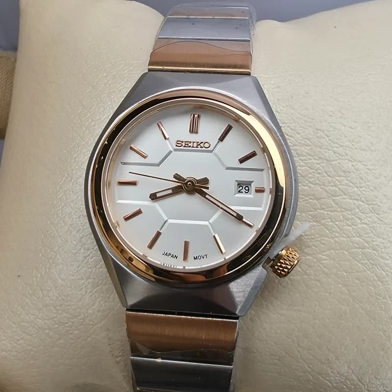 ساعت مچی ست اورجینال سیکو جنرال موتور ژاپن نقره ای رزگلد سفید مدل 1111G — تصویر ۲