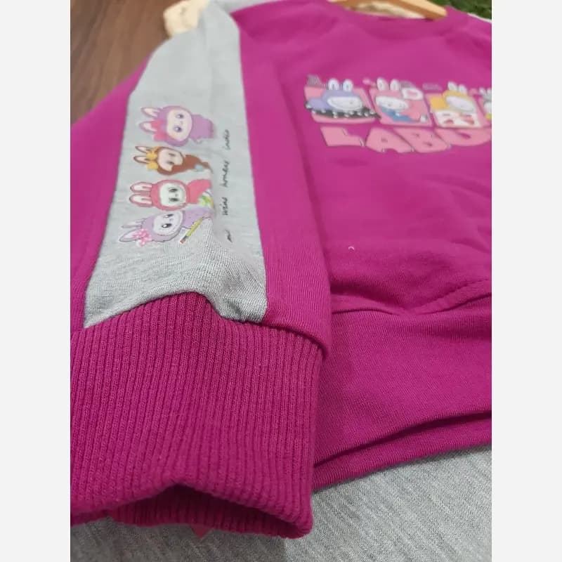 ست کراپ و شلوار بگ طرح لبوبو پنبه ملانژ پشت دورس سایز 1 و 2 — تصویر ۵