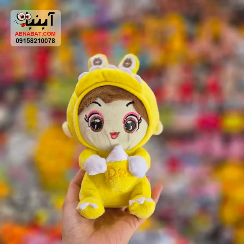 عروسک بچه شیشه بدست زرد 18 سانتی کد 1457 — تصویر ۳