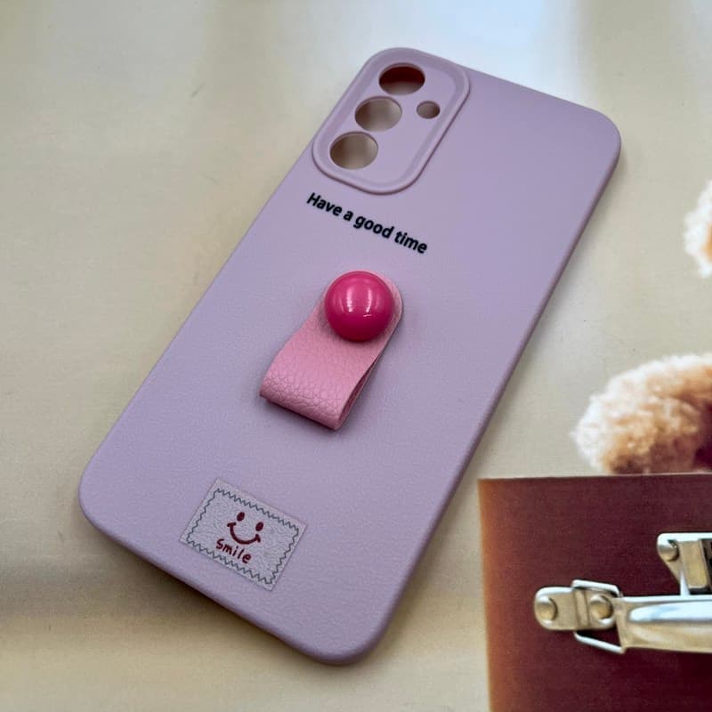 قاب گوشی Galaxy A15 سامسونگ Finger Hold سیلیکونی فینگر بند هولدری عروسکی برجسته محافظ لنز دار طرح Smile کد 788841 — تصویر ۲