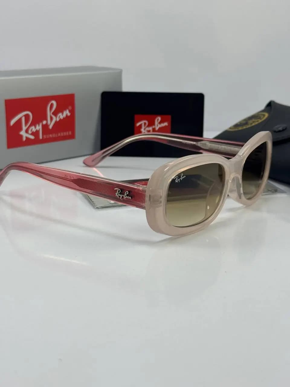 عینک ریبن صورتی عسلی rayban rb-2221 f