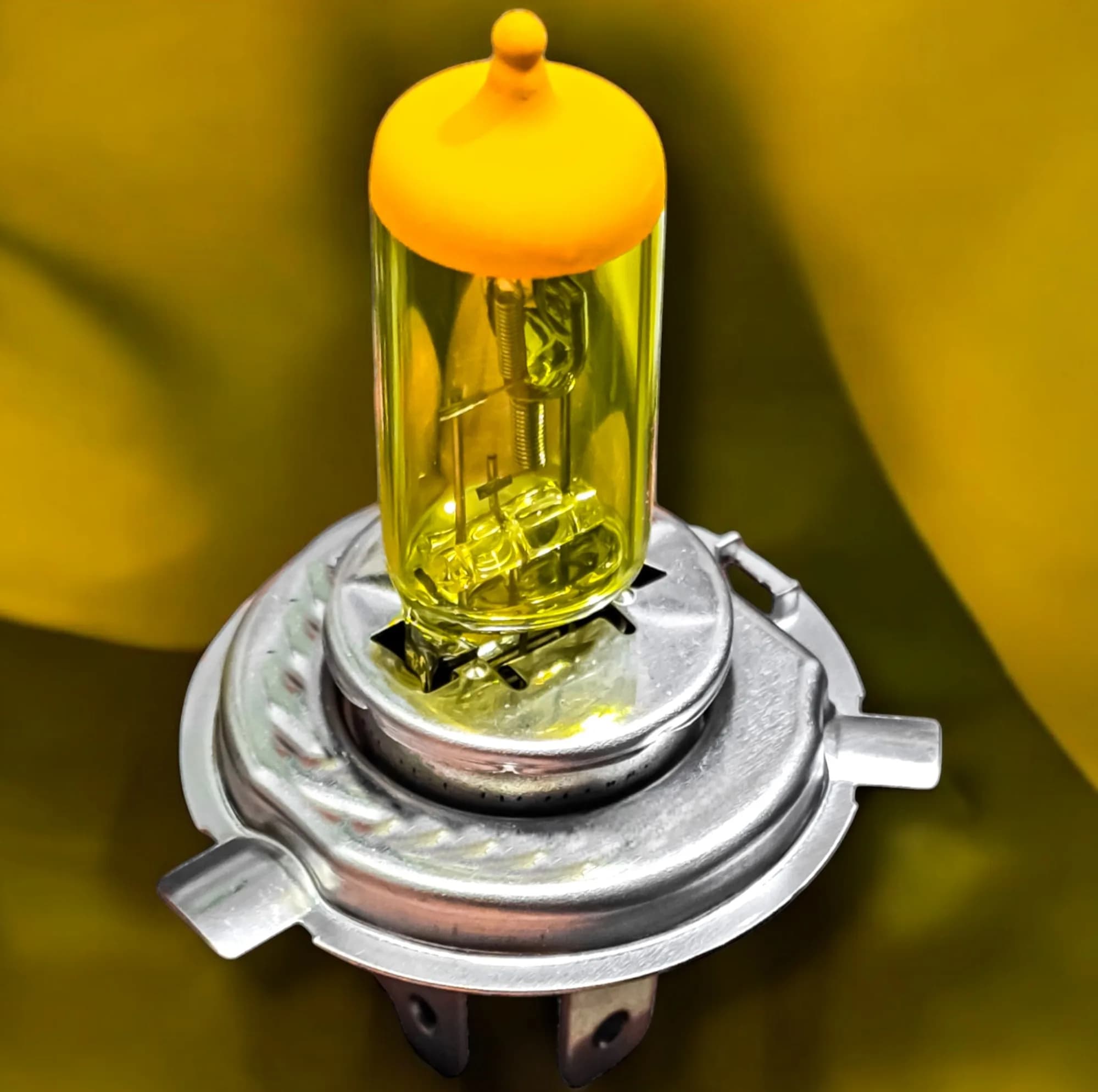 لامپ چراغ جلو خودرو تک حالته فورس مدل Limo.YLW کد 55W پایه H4 مناسب برای پراید صبا و پراید نسیم بسته ۲ عددی — تصویر ۳