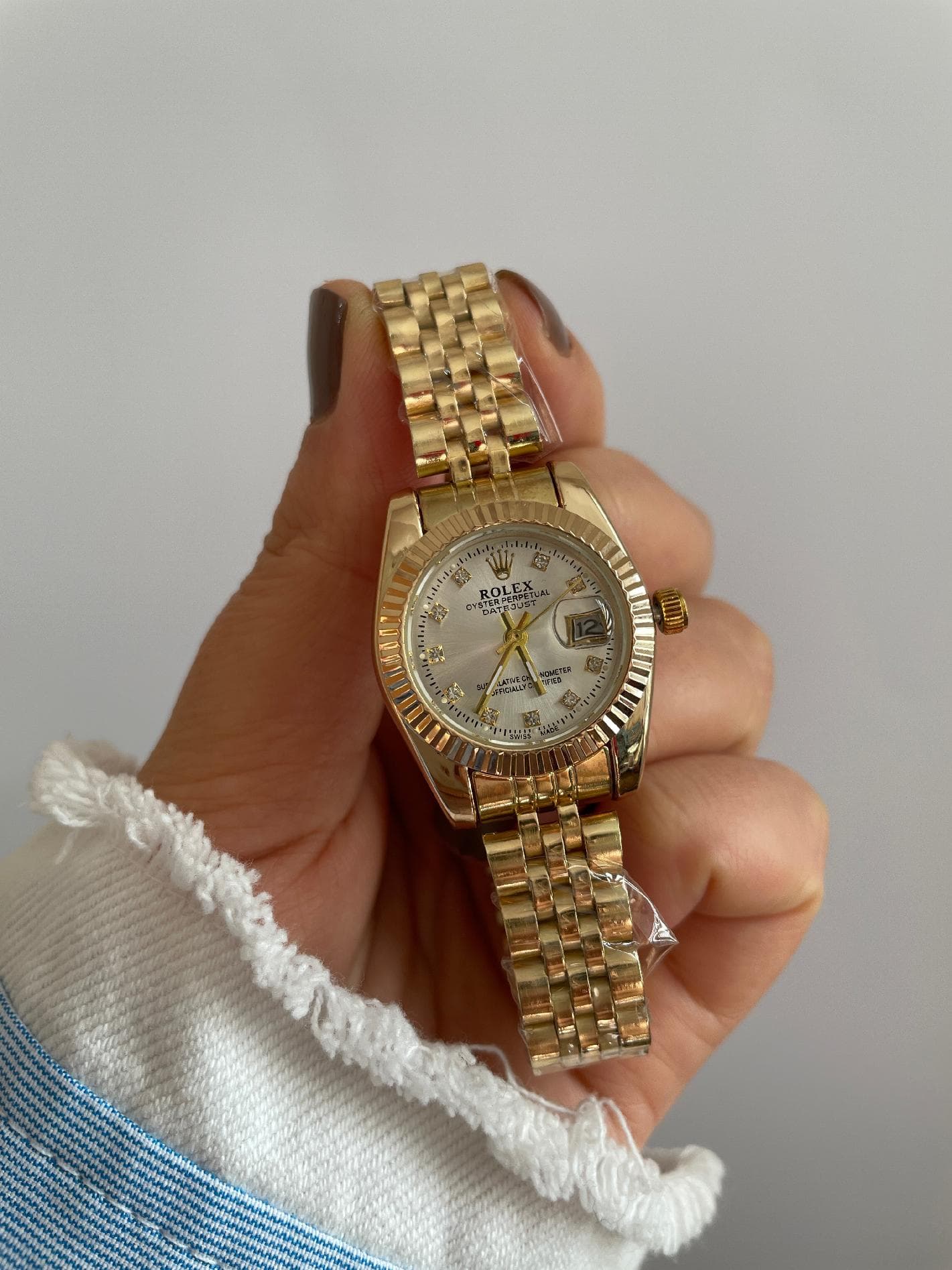 ساعت مچی زنانه رولکس طلائی مدل Datejust با صفحه صدفی نگین‌دار