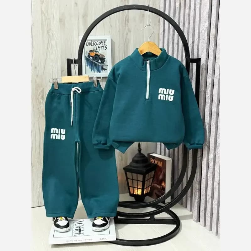 ست بلوز نیم زیپ و شلوار توکرکی مدل Miu Miu — تصویر ۴