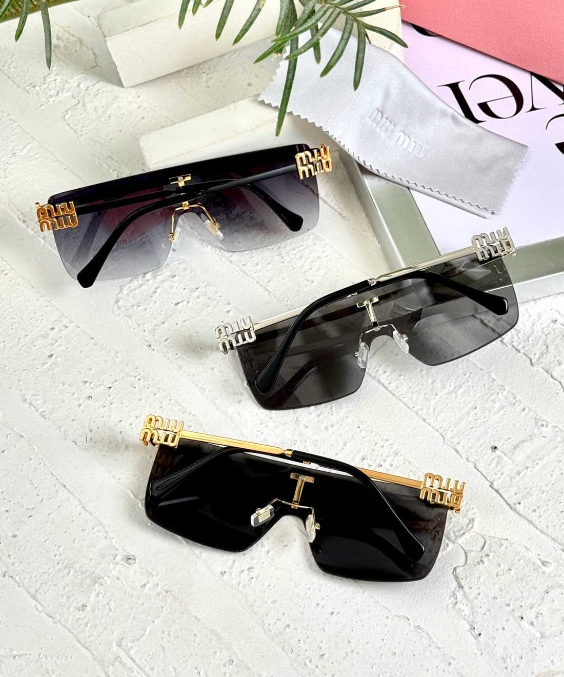 عینک آفتابی زنانه میو میو مدل MIU MIU SMU50Z (sl) — تصویر ۴