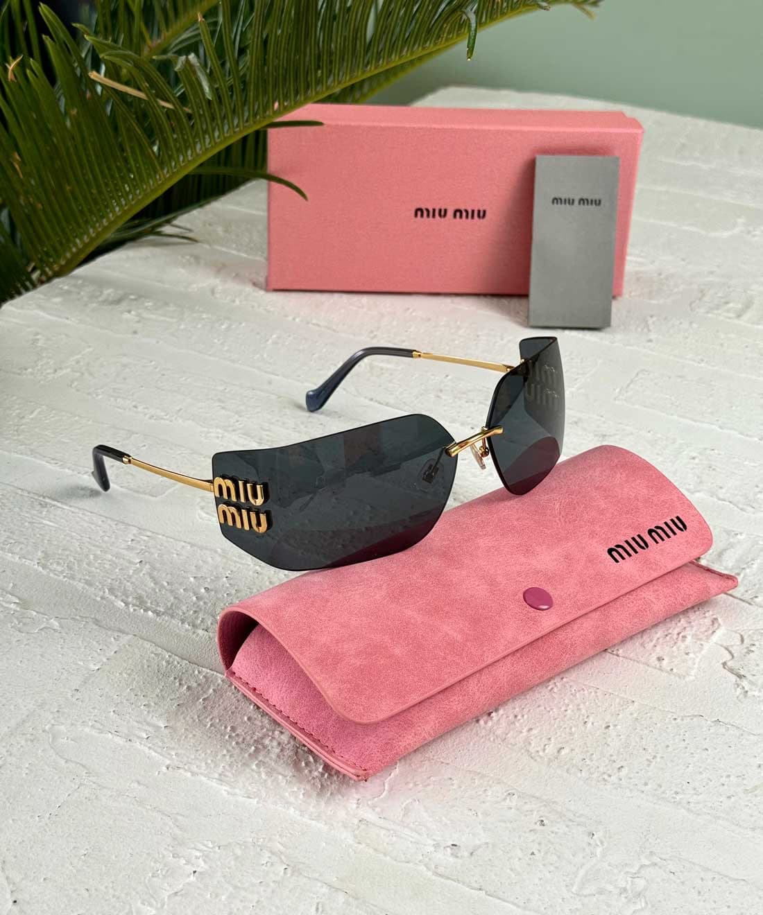 عینک آفتابی زنانه میو میو مدل MIUMIU SMU 54Y — تصویر ۵