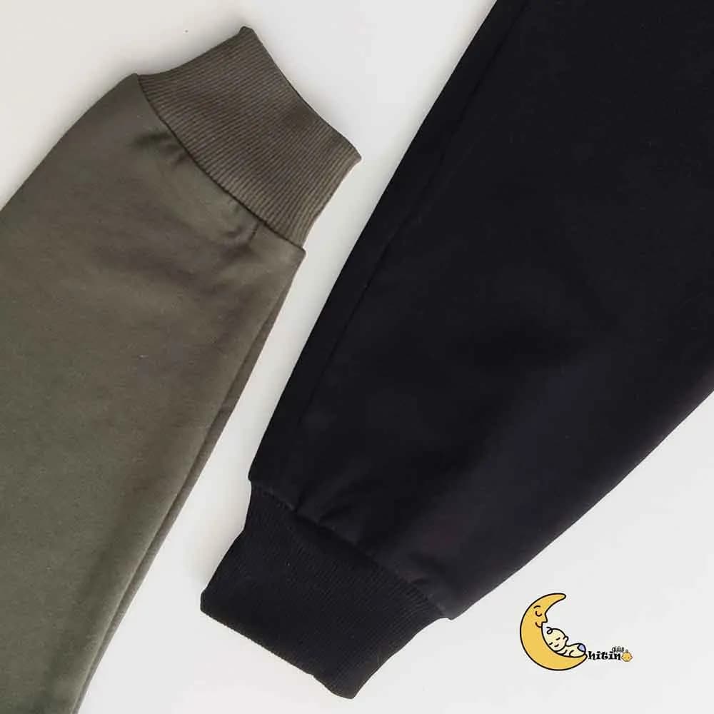ست بلوز و شلوار دورس پسرانه و دخترانه طرح پازل سایز 5 تا 14 سال — تصویر ۵