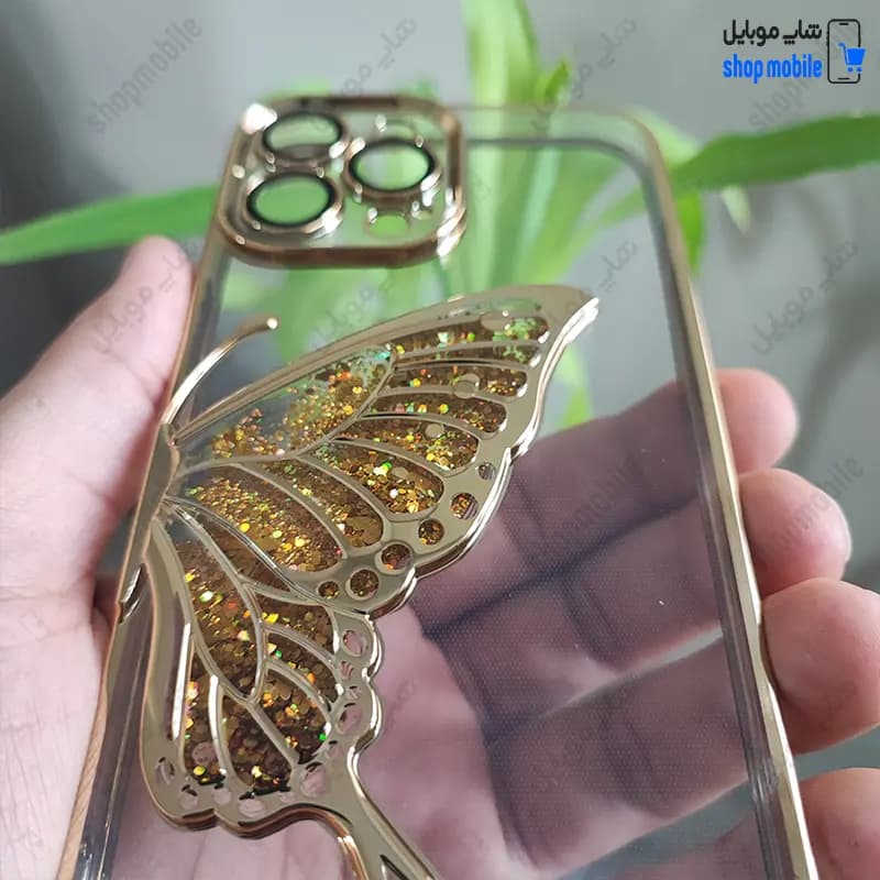 قاب گوشی آیفون 14 پرو مکس (کاور Unique محافظ لنز دار طرح بال پروانه آکواریومی رنگ طلایی) — تصویر ۳