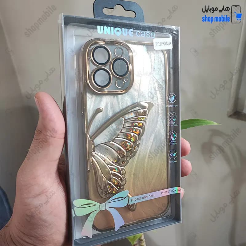 قاب گوشی آیفون 14 پرو مکس (کاور Unique محافظ لنز دار طرح بال پروانه آکواریومی رنگ طلایی) — تصویر ۴