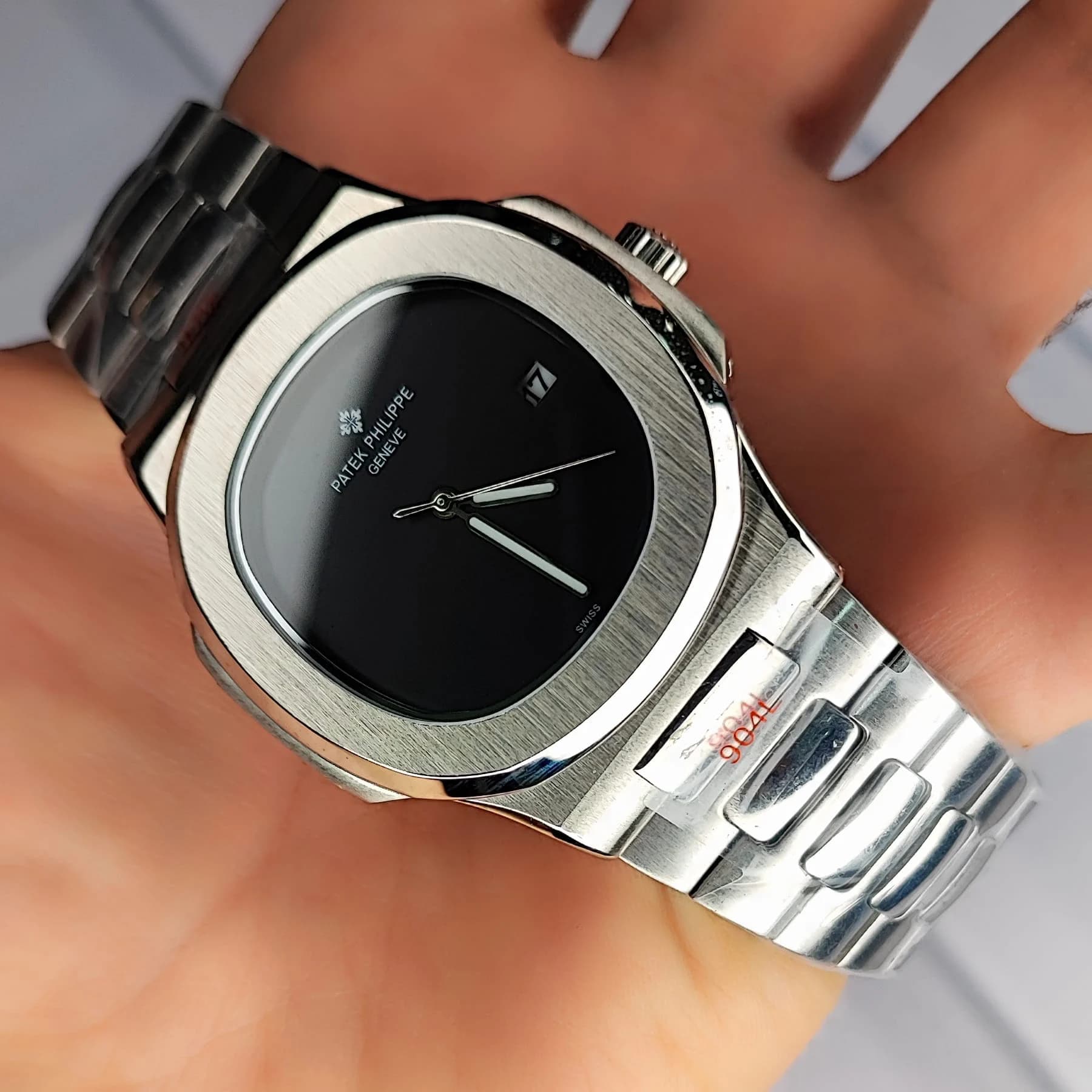 ساعت مچی مردانه پتک فیلیپ موتور ژاپن مدل ناتیلوس نقره ای مشکی (Patek Philippe Nautilus) — تصویر ۴