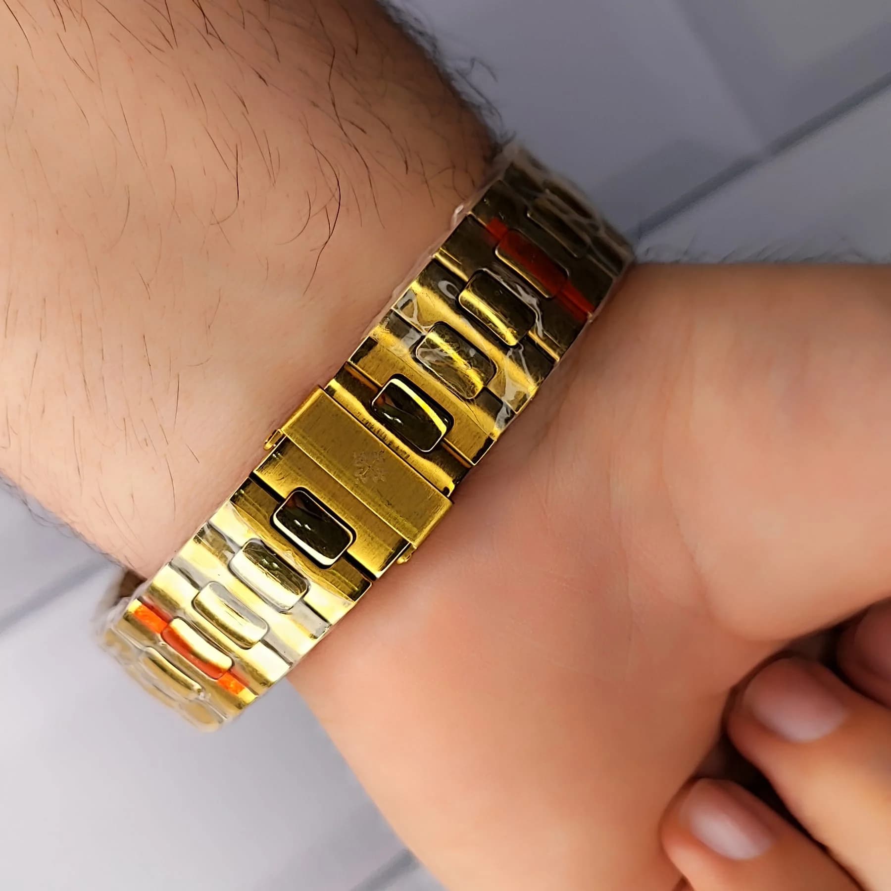 ساعت مچی مردانه پتک فیلیپ موتور ژاپن مدل ناتیلوس طلایی مشکی (Patek Philippe Nautilus) — تصویر ۷